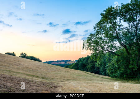 Dumpdon fort de colline, la belle vallée de l'Otter près de Beacon, Honiton, Devon, UK. Campagne britannique au coucher du soleil . Banque D'Images