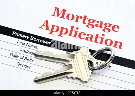 Demande de prêt hypothécaire immobilier Document de prêt avec des clés de la maison Banque D'Images