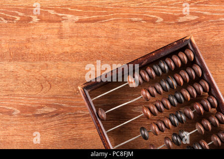 Abacus sur une table en bois en arrière-plan close up Banque D'Images
