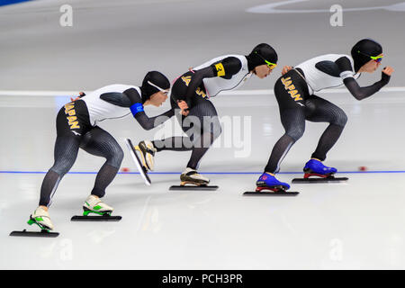 La femme japonaise Miho Takagi # 1, Ayano Sato # 3,Nana Takagi # 4 concurrence dans l'équipe féminine de patinage de vitesse poursuite finale aux Jeux Olympiques d'hiver Banque D'Images