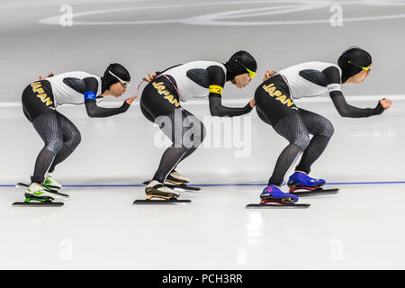 La femme japonaise Miho Takagi # 1, Ayano Sato # 3,Nana Takagi # 4 concurrence dans l'équipe féminine de patinage de vitesse poursuite finale aux Jeux Olympiques d'hiver Banque D'Images