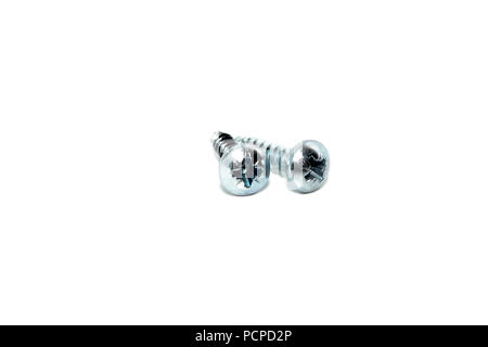 Un couple des vis en acier industriel galvanisé isolé sur fond blanc Banque D'Images