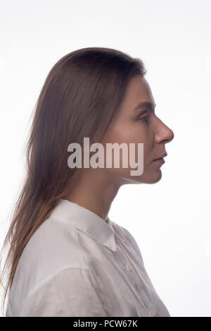 Entreprise sérieuse fille avec de longs cheveux. Vue de profil Banque D'Images