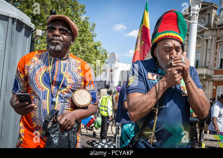 Afrikan annuelle La Journée de l'émancipation des réparations rallye et mars à Brixton, dans le sud de Londres, au Royaume-Uni. Banque D'Images