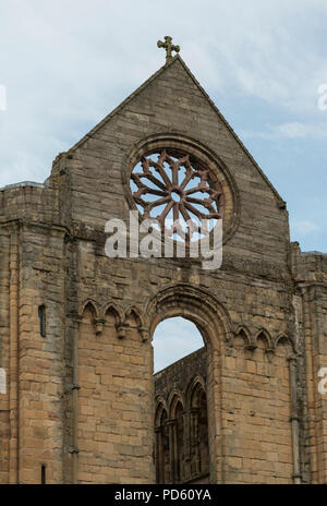 Détail architectural des ruines de l'abbaye de Jedburgh, une Abbaye Augustinienne de styles roman et gothique précoce. Banque D'Images