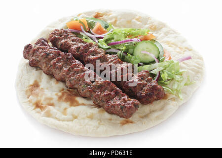 Naan shish kebab wrap sandwich Banque D'Images