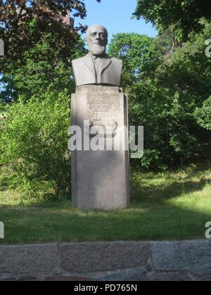 Anders Petter Löfström (1944), je byst Sundbyberg, svart granit utförd av Carl Fagerberg, 2018b. Banque D'Images