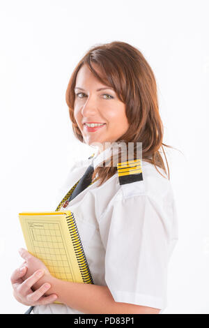 Belle femme pilote en uniforme avec des papiers Banque D'Images