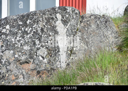 Figure sculpté dans la roche, Qaqortoq (Groenland). Juillet, 2018 Banque D'Images