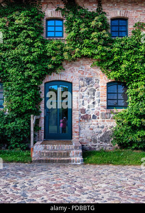 Gutshaus Stolpe,Allemagne,Stolpe Manor. La vieille ville historique d'extérieur de bâtiment maintenant utilisé comme hôtel quatre étoiles avec restaurant étoilé au guide Michelin à côté de la rivière Peene Banque D'Images