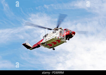 HM Hélicoptère des garde-côtes a photographié à l'ouest de Inverness. Sikorsky S-92-G inscription MCGF. Banque D'Images