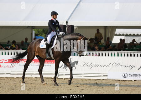 Ingrid Klimke avec Bluetooth a remporté la spéciale St Georg à l'Verden Concours Hippique International 2018, la qualification pour le Nürnberger-Burg Pokal Banque D'Images