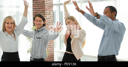 L'équipe d'affaires multiethniques heureux .la notion de travail en équipe Banque D'Images