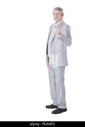 En pleine croissance.Mature businessman showing thumb up Banque D'Images