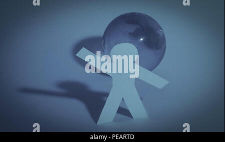 Papier élégant homme debout près de la planète Banque D'Images