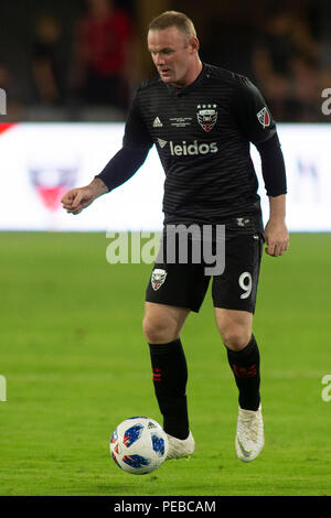 Washington, United States. 14 juillet, 2018. D.C. United Wayne Rooney (9) DRIBBLE pendant le jeu entre D.C. United et les Whitecaps de Vancouver à Audi a déposé à Washington, DC Le 14 juillet 2018. C'est DC D.C. United's premier jeu à Audi. Crédit : l'accès Photo/Alamy Live News Banque D'Images