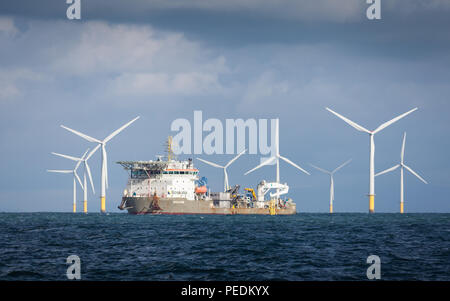 L'installation du câble navire "Ndeavor" travaillant sur l'Extension de parcs offshore Walney Banque D'Images