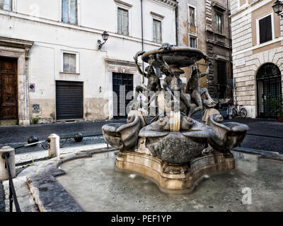 La fontaine des tortues est une fontaine de la fin Renaissance italienne, situé sur la Piazza Mattei, dans le quartier de Sant'Angelo Rome, Italie. Banque D'Images