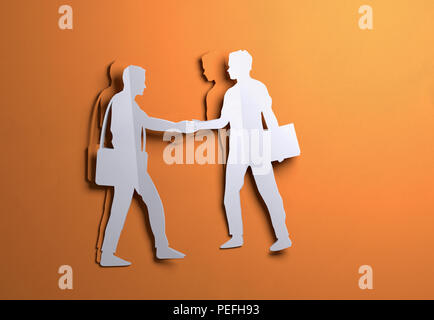 Papier plié origami. Deux Businessman shaking hands sur une entente commerciale occasion.en papier 3D illustration. Banque D'Images