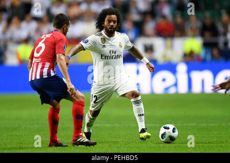 Tallinn, Estonie. Août 15, 2018. Marcelo (R) du Real Madrid rivalise avec Koke de l'Atletico Madrid lors de la Super Coupe de l'UEFA match à Lillekula Statium à Tallinn, Estonie, 15 août 2018. L'Atletico Madrid a gagné 4-2. Crédit : Sergei Stepanov/Xinhua/Alamy Live News Banque D'Images