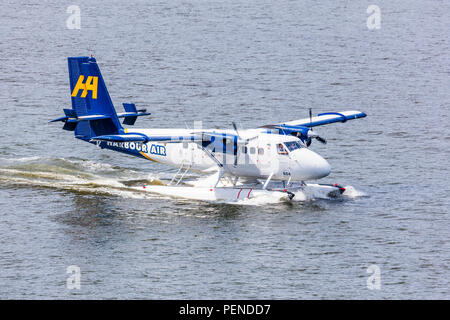 C-FGQH exploité par hydravion, un de Havilland DHC-6-100 Twin Otter, prendre les touristes pour un vol de plaisance du port de Vancouver, British Columbia, Canada Banque D'Images