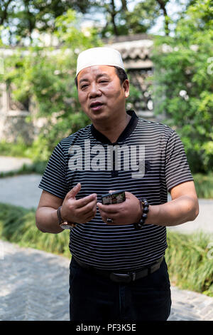 Yangzhou, Jiangsu, Chine. L'Imam à l'ouïgour cimetière de Puhaddin, 13ème siècle missionnaire musulman. Banque D'Images