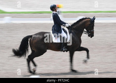 Jakarta, Indonésie. 20e Août, 2018. Terui Shunsuke du Japon fait concurrence au cours de l'équipe de dressage équestre lors de la 18e Finale des Jeux Asiatiques à Jakarta, Indonésie, le 20 août 2018. Crédit : Du Yu/Xinhua/Alamy Live News Banque D'Images