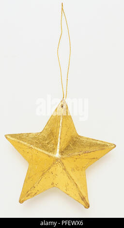Pendentif Gold Star ornament, Close up Banque D'Images