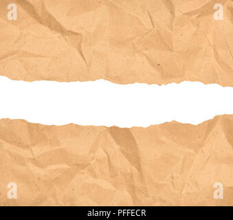 Brown paper coupé en deux isolated over white background Banque D'Images