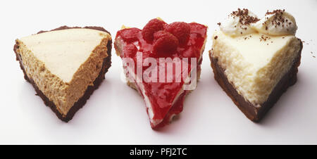 Trois morceaux de fromage aromatisé Banque D'Images