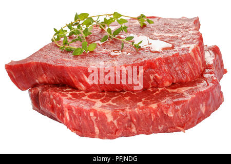 Close-up de deux biftecks de contre-filet de boeuf marbré au thym isolé sur fond blanc, côté Vue du dessus Banque D'Images