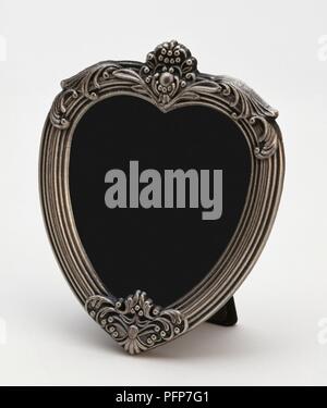 Cadre photo argenté en forme de coeur Banque D'Images