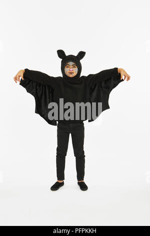 Enfant habillé comme une chauve-souris pour Halloween Banque D'Images