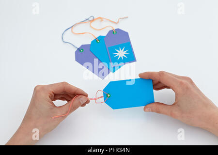 Looping fil par gift tag Banque D'Images