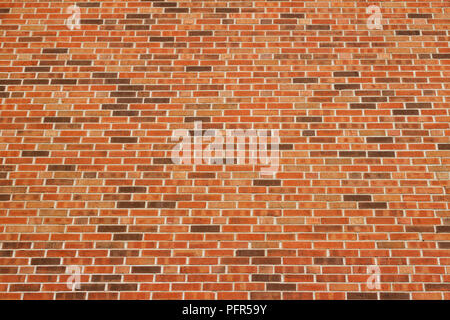Rouge vibrant et marron vintage brick wall background avec une civière flamande bond motif brique vers le haut (voir) Banque D'Images