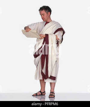 Homme habillé comme citoyen romain port toga (flèche de papier Banque D'Images