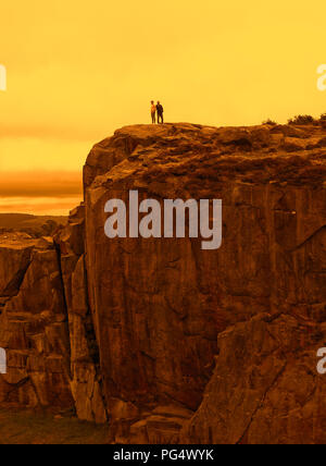 Coucher de soleil sur les roches de vache veau et Ilkley Moor Banque D'Images