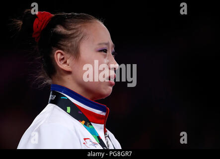 Jakarta. Août 24, 2018. Kim Su Jung de la RPDC pleure pendant la cérémonie pour la gymnastique artistique de l'étage final de l'exercice aux Jeux asiatiques 2018 à Jakarta, Indonésie le 24 août 2018. Credit : Wang Lili/Xinhua/Alamy Live News Banque D'Images