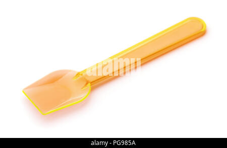 Cuillère à glace en plastique orange isolated on white Banque D'Images