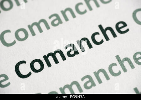 Langue de texte imprimé sur papier blanc macro Banque D'Images