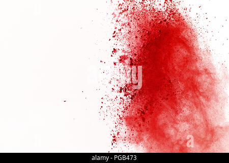 Résumé rouge en poudre d'explosion au fond blanc. abstract red dust splatted sur fond blanc, mouvement de gel poudre rouge éclatant. Banque D'Images