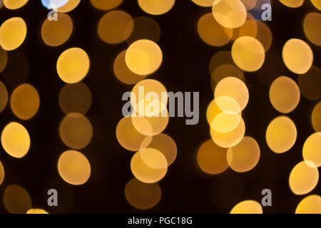 Ampoules d'or abstrait. Lumières floues. Banque D'Images