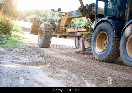 Route de campagne de construction, pelleter avec grain grader Banque D'Images