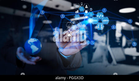 Businessman travaillant avec de nouveaux ordinateur moderne Voir réseau social structureCoding développeur de logiciels de réalité augmentée avec planche de bord ordinateur ico Banque D'Images