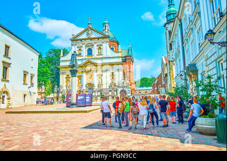 Cracovie, Pologne - 11 juin 2018 : La petite Sainte Marie Madeleine Square possède de magnifiques bâtiments environnants, tels que l'église St Pierre et Paul, le Pont Banque D'Images