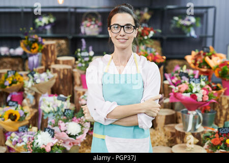 Portrait de femme floser shop owner posant avec confiance et looking at camera Banque D'Images