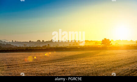 Un matin tôt la fin de l'été lever du soleil à Hough sur la Colline, Grantham, Lincolnshire, Royaume-Uni Banque D'Images