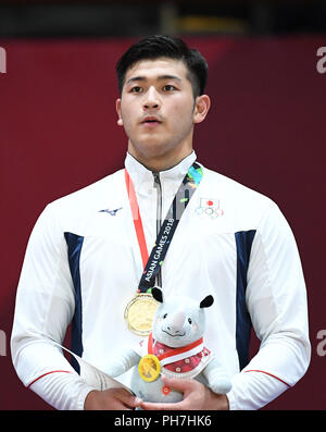 (180831) --JAKARTA, 31 août 2018 (Xinhua) -- Kentaro Iida du Japon assiste à la cérémonie de men's Judo -100kg lors de la 18e Finale des Jeux Asiatiques à Jakarta, Indonésie le 31 août 2018. A remporté la médaille d'Iida. (Xinhua/Li Il) Banque D'Images