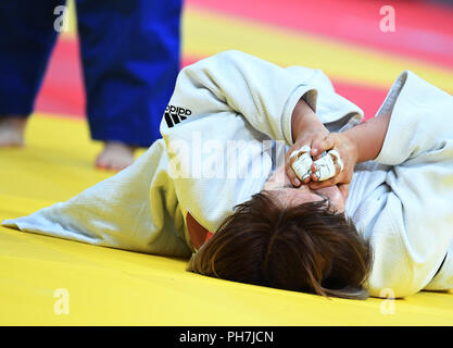 (180831) --JAKARTA, 31 août 2018 (Xinhua) -- Minjeong Kim de Corée du Sud réagit après les 78kg judo final avec Sone Akira du Japon à la 18e Jeux asiatiques à Jakarta, Indonésie le 31 août 2018. (Xinhua/Li Il) Banque D'Images