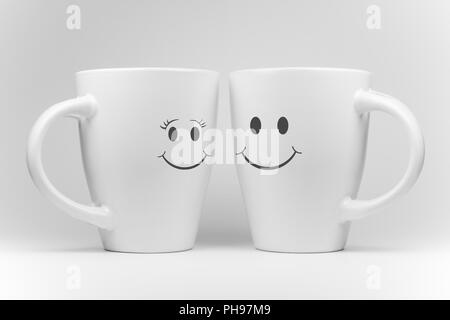 Deux tasses de blanc avec des expressions faciales Banque D'Images